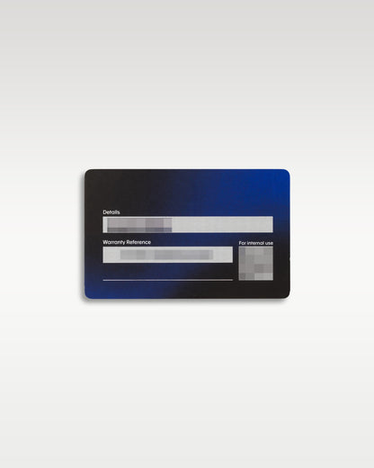 reverse side of the official blue and black TAG Heuer digital international warranty smart card flat-laid on a light studio background
