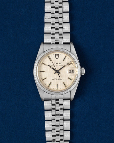 Vintage Tudor Prince Oysterdate 34mm 75204 stainless steel watch with a champagne linen textured dial and white gold fluted bezel at Grand Caliber Dallas