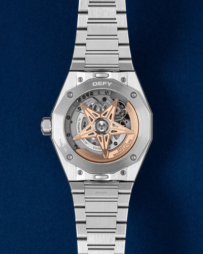 Sapphire exhibition caseback showing the star-shaped oscillating weight rotor of the El Primero high-frequency automatic movement