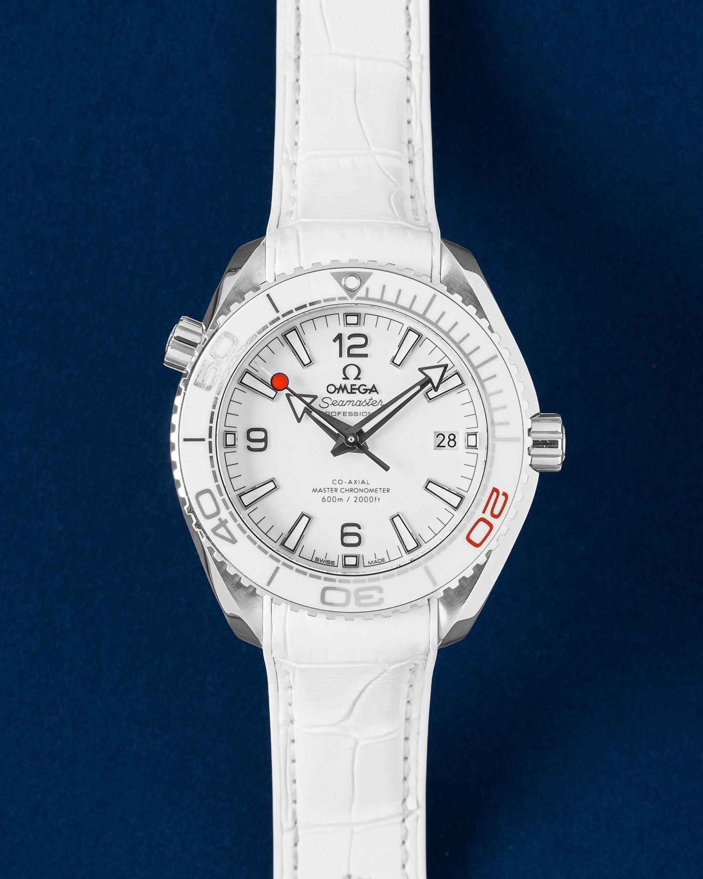 Pre-owned Omega Seamaster Planet Ocean 600M Tokyo 2020 Olympic Games Limited Edition 522.33.40.20.04.001 white ceramic dial watch at Grand Caliber Dallas
