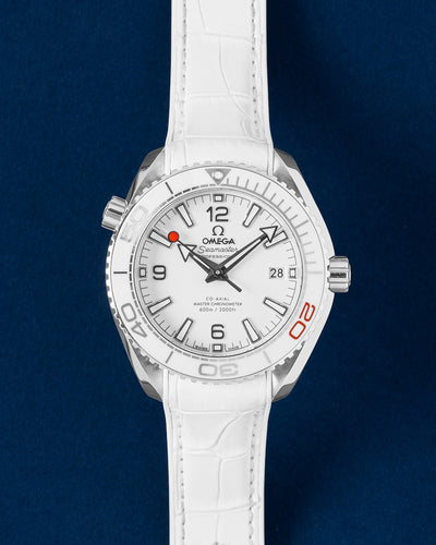 Pre-owned Omega Seamaster Planet Ocean 600M Tokyo 2020 Olympic Games Limited Edition 522.33.40.20.04.001 white ceramic dial watch at Grand Caliber Dallas