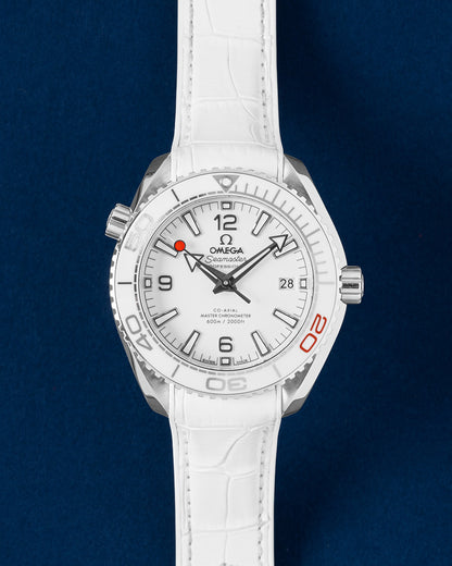 Pre-owned Omega Seamaster Planet Ocean 600M Tokyo 2020 Olympic Games Limited Edition 522.33.40.20.04.001 white ceramic dial watch at Grand Caliber Dallas