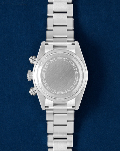 The solid satin-finished stainless steel screw-down caseback on a Tudor Black Bay Chronograph