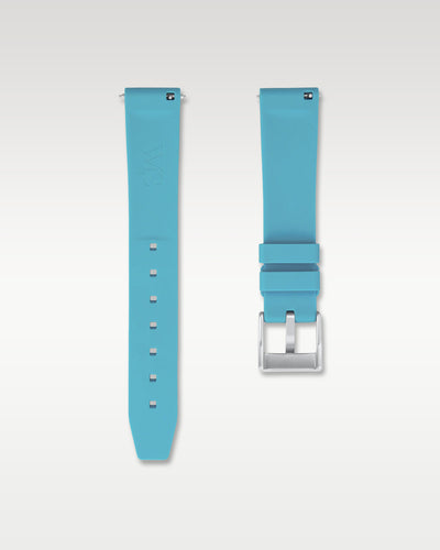 Underside view of WISSTRAPS 18mm miami blue quick release rubber watch strap showing logo and quick-release spring bars