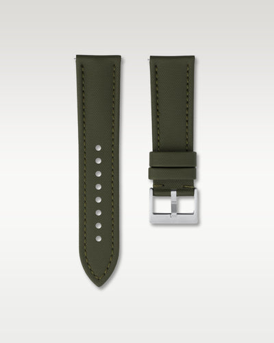 Front view of a 24mm tactical army green sailcloth watch strap showing its cross-hatch fabric weave and brushed steel pin buckle