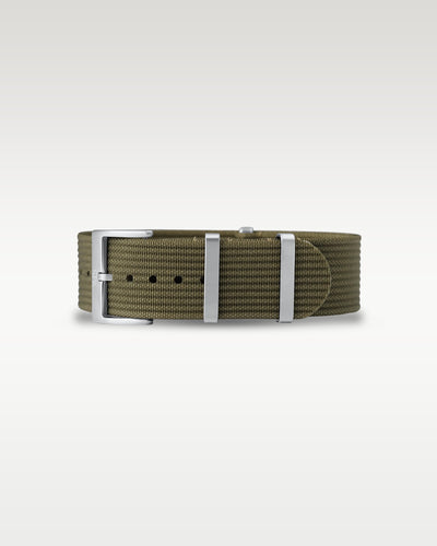 Flat layout view of an army green woven nylon watch strap folded with brushed silver hardware