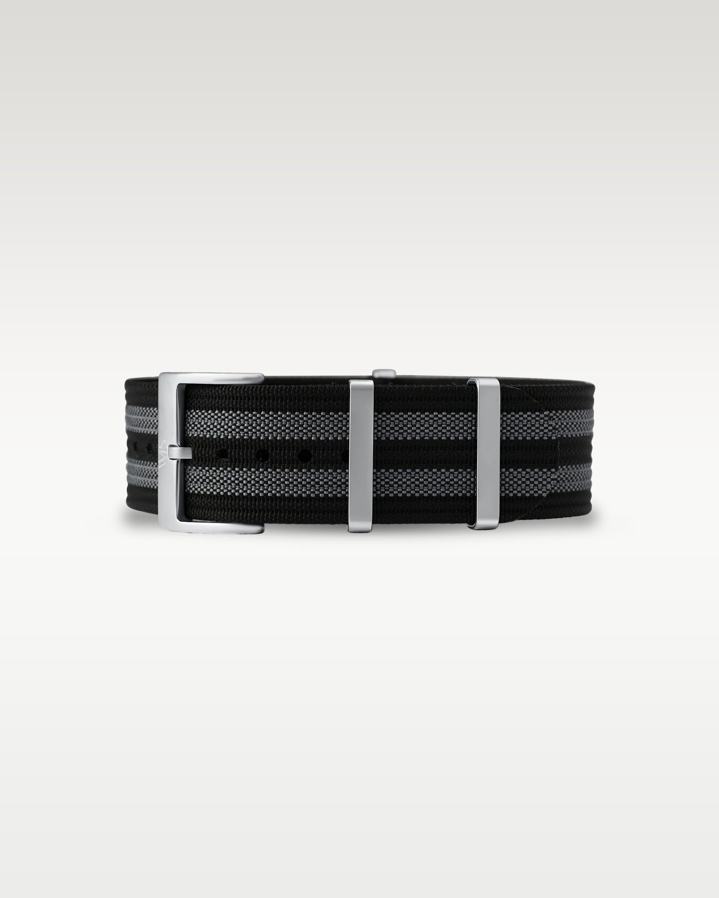 Flat view of a black and grey striped woven nylon watch strap folded with brushed steel keepers