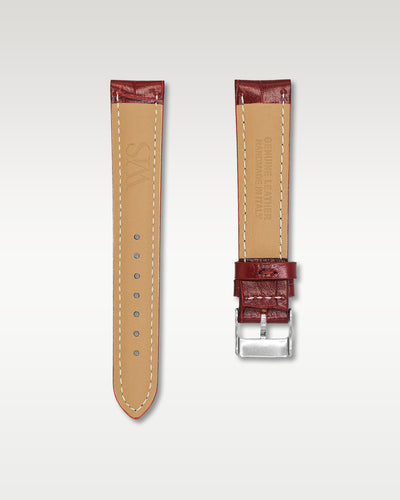 Underside view of WISSTRAPS 18mm Cherry Red leather watch strap showing soft tan lining and stamped brand logo