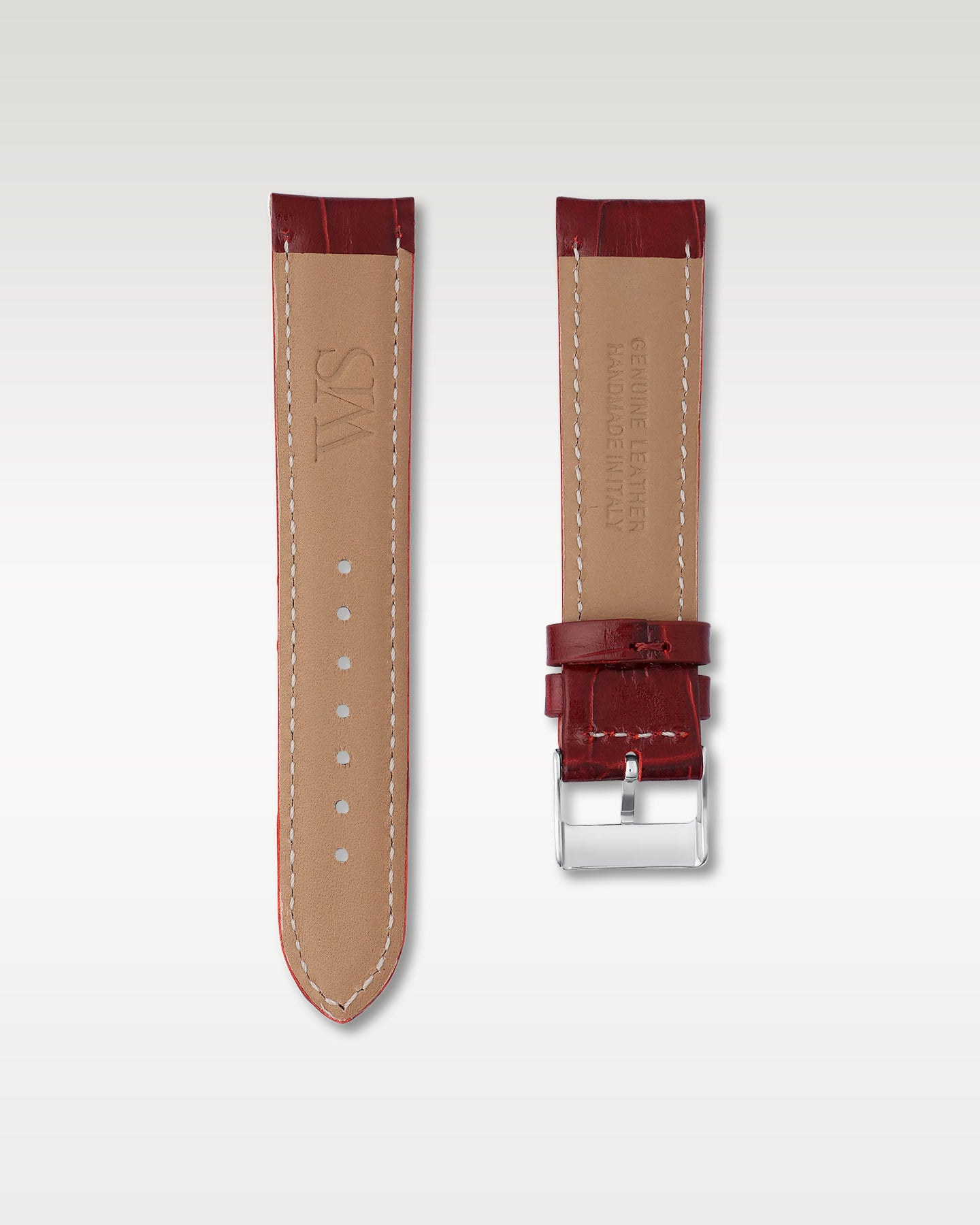 Underside view of WISSTRAPS 20mm Cherry Red leather watch strap showing soft tan lining and stamped brand logo
