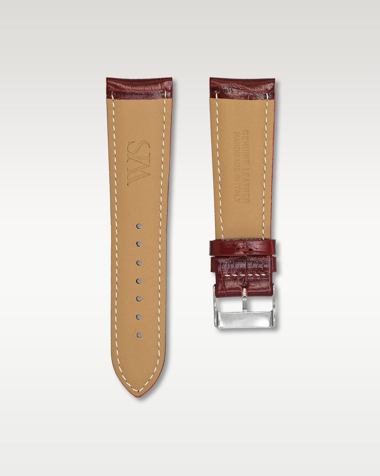 Underside view of WISSTRAPS 24mm Cherry Red leather watch strap showing soft tan lining and stamped brand logo