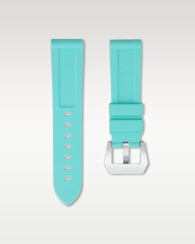 Pair view of WISSTRAPS 24mm Glacier Blue calibrated rubber watch strap showing seamless case alignment and spring bars