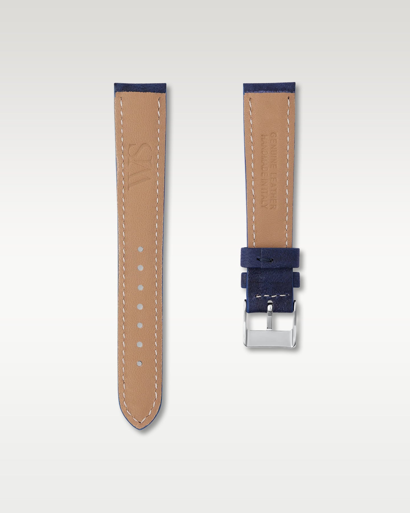 Underside view of WISSTRAPS 18mm Midnight Blue leather watch strap showing soft tan lining and stamped brand logo
