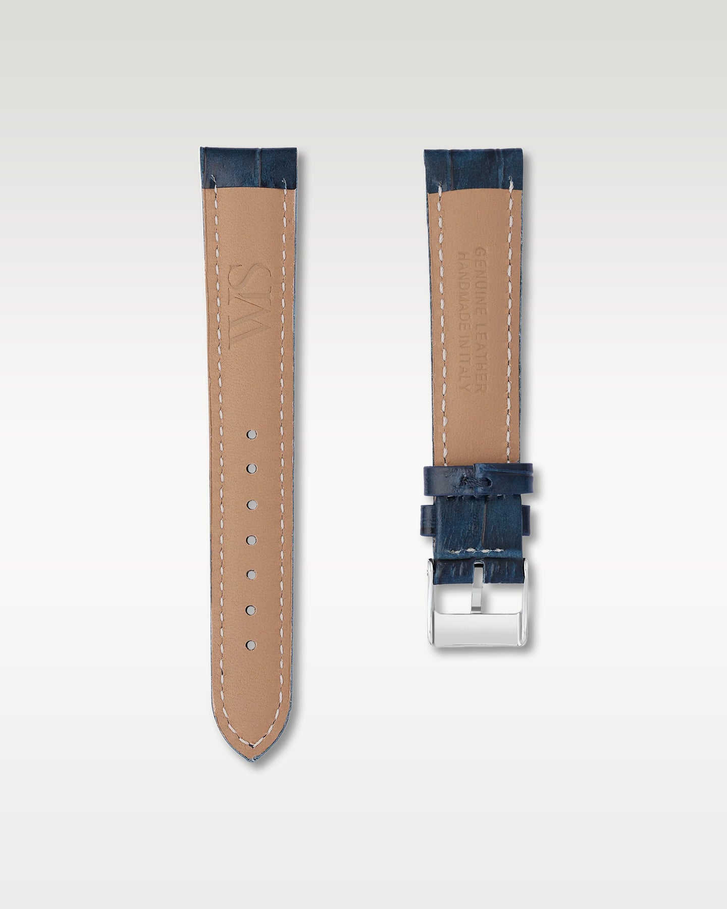 Underside view of WISSTRAPS 18mm Midnight Blue leather watch strap showing soft tan lining and stamped brand logo