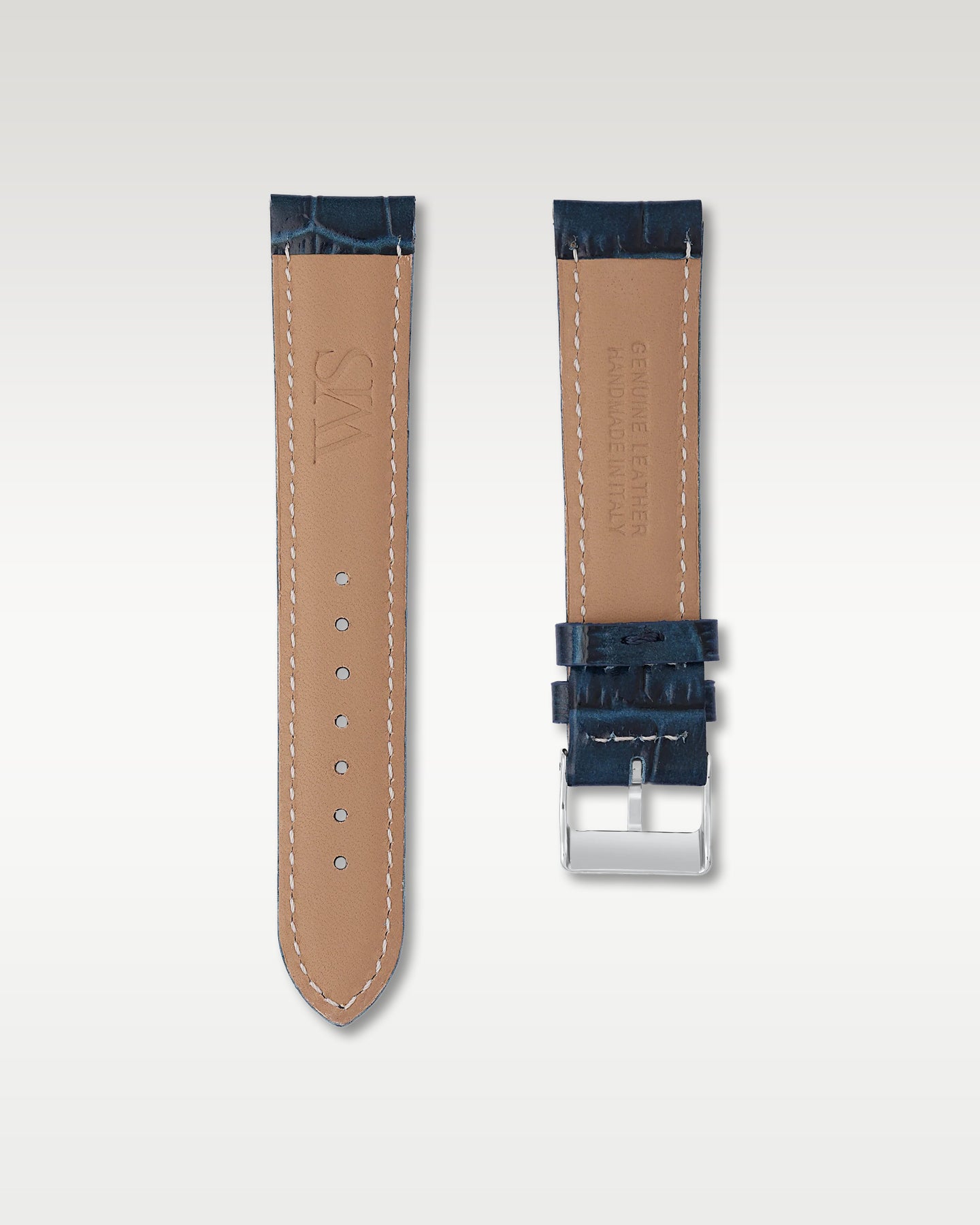 Underside view of WISSTRAPS 20mm Midnight Blue leather watch strap showing soft neutral tan lining and stamped brand logo