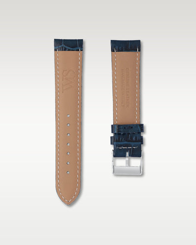 Underside view of WISSTRAPS 20mm Midnight Blue leather watch strap showing soft neutral tan lining and stamped brand logo