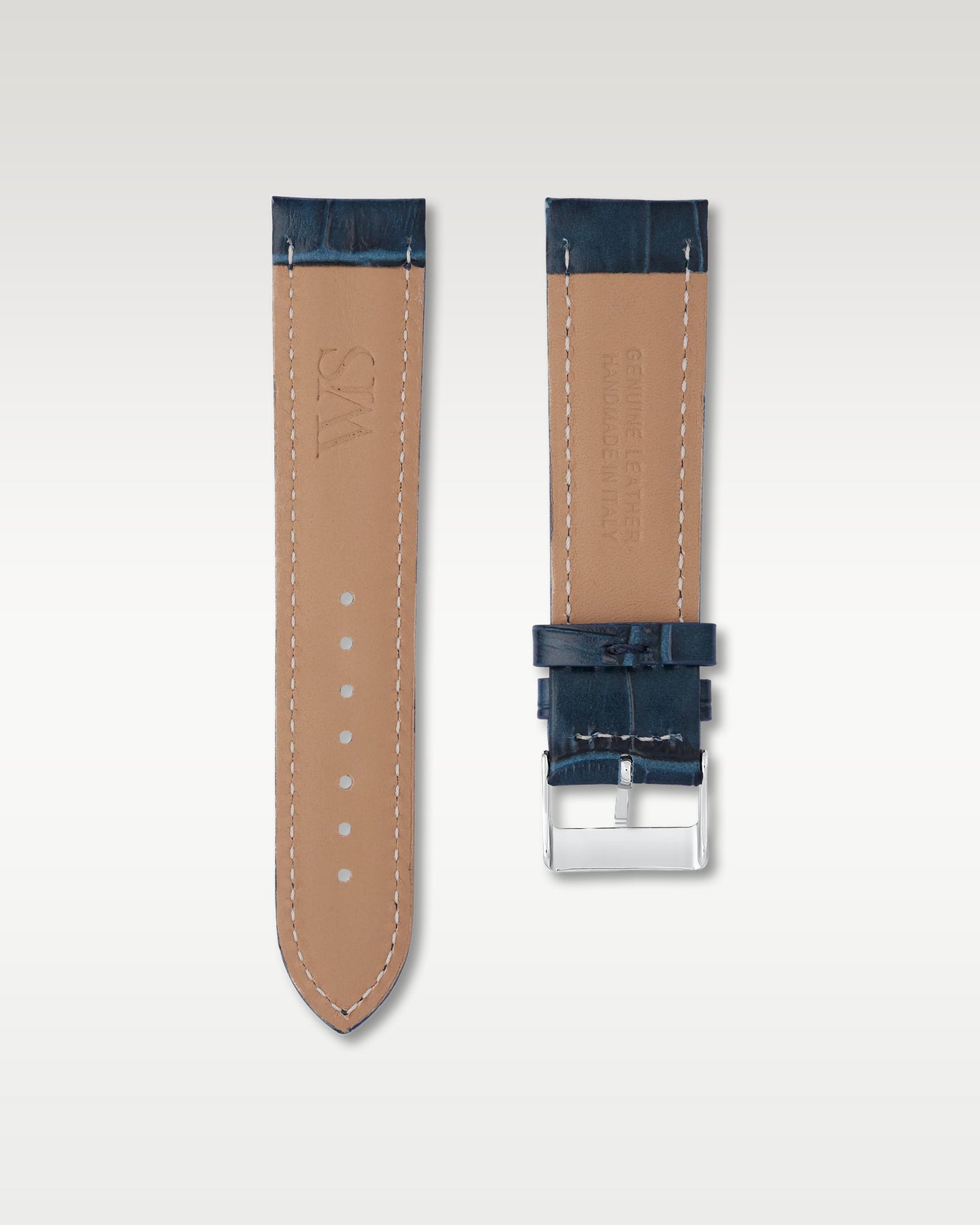Underside view of WISSTRAPS 22mm Midnight Blue leather watch strap showing soft tan lining and stamped brand logo