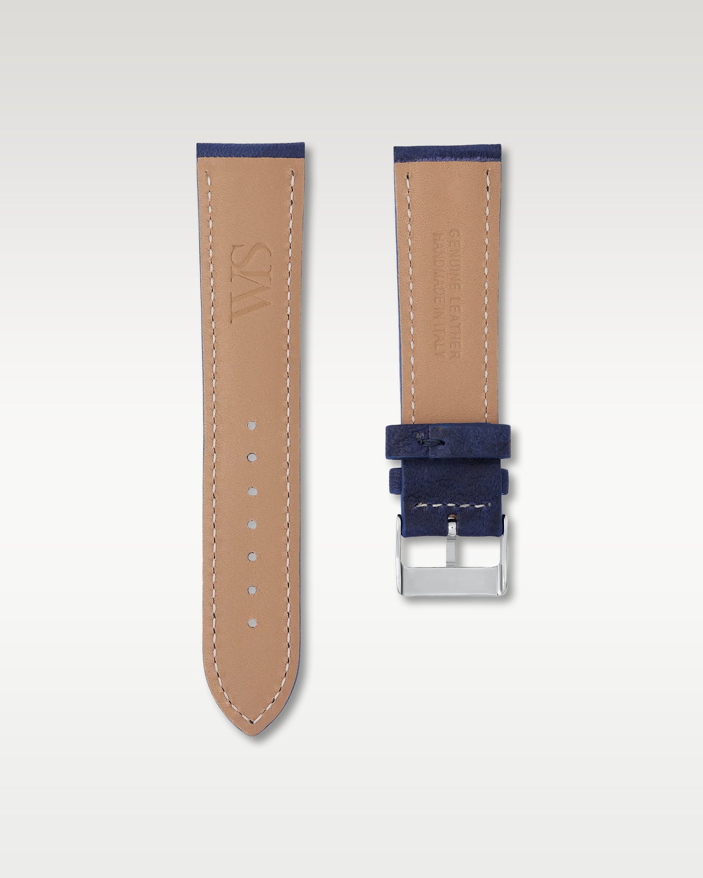 Reverse side of WISSTRAPS 22mm Midnight Blue strap showcasing soft natural tan lining and embossed logo branding