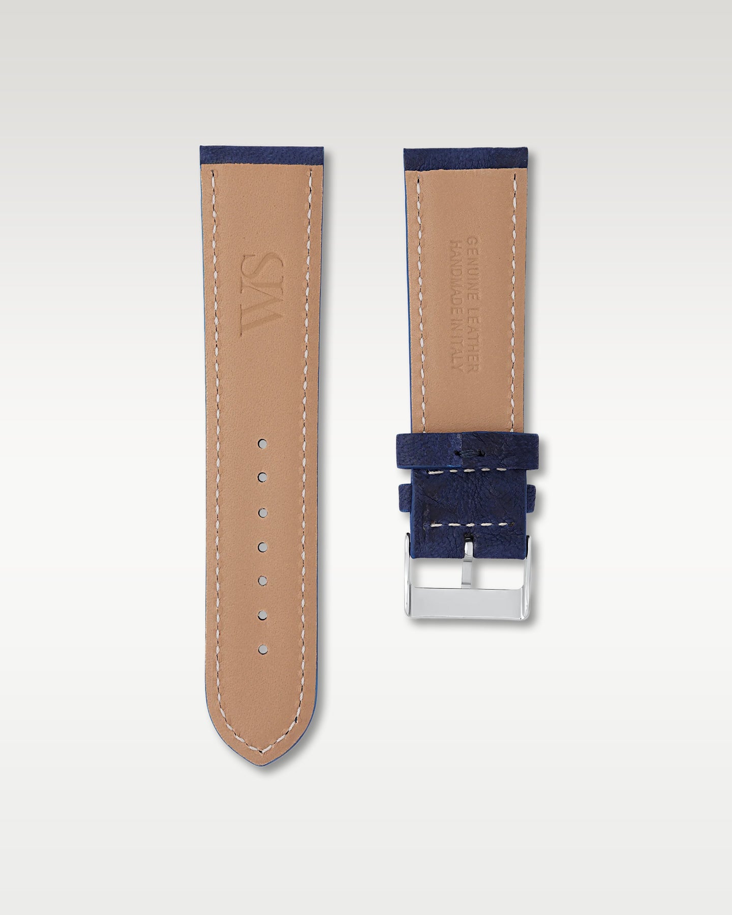 Underside view of the WISSTRAPS 24mm Midnight Blue Italian calf leather strap showing the stamped WS logo and soft tan lining