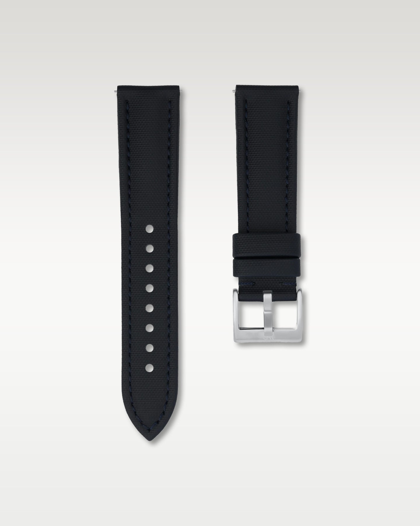 Front layout view of a 22mm deep navy sailcloth watch band highlighting its cross-hatch fabric weave and brushed steel pin buckle
