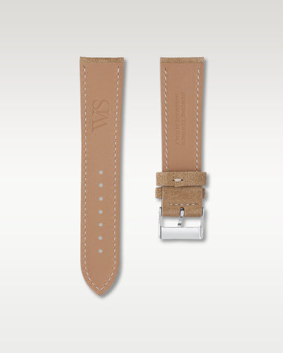 Underside view of WISSTRAPS 22mm Sand Tan suede leather watch strap showing soft tan lining and stamped brand logo