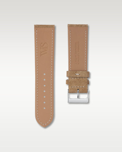 Underside view of WISSTRAPS 24mm Sand Tan suede leather watch strap showing soft tan lining and stamped brand logo