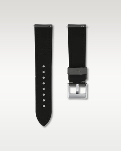 Reverse side view of a 22mm slate grey sailcloth watch strap showing integrated quick-release spring levers and black inner lining