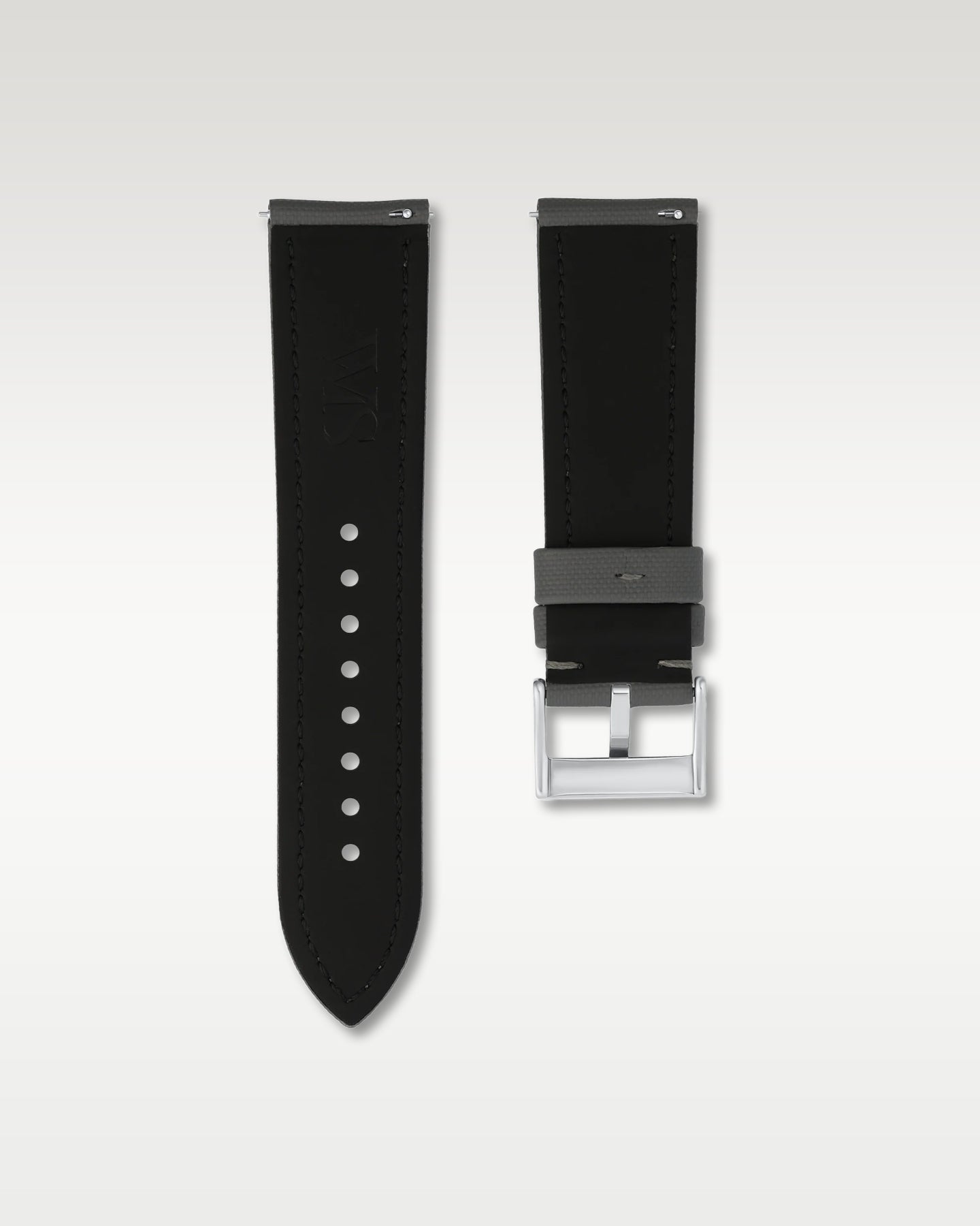 Underside view of a 24mm slate grey sailcloth watch band detailing the black inner lining, integrated quick-release levers, and WIS buckle