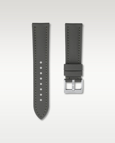 Front layout view of a 22mm slate grey sailcloth watch band highlighting its cross-hatch fabric weave and brushed steel pin buckle