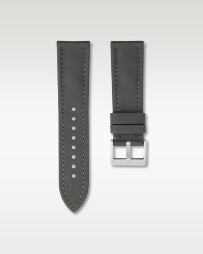 Front view of a 24mm slate grey sailcloth watch band showcasing its woven cross-hatch fabric texture and brushed steel pin buckle