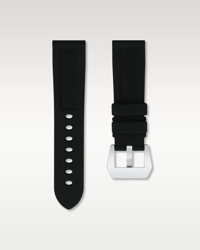 under side view of WISSTRAPS 22mm Tuxedo Black calibrated rubber watch strap with pre-installed silver pin buckle and spring bars