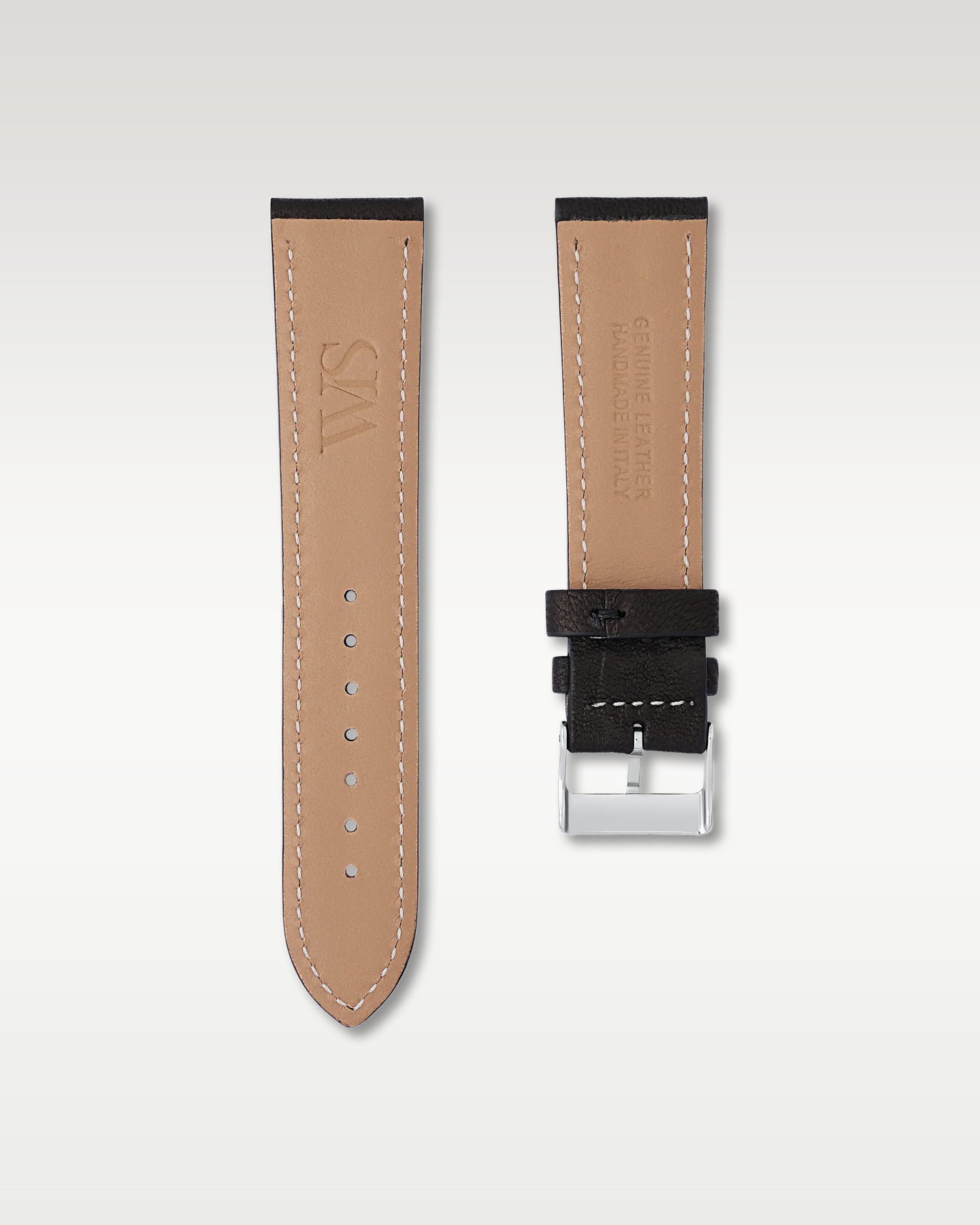 Reverse side of WISSTRAPS 22mm Tuxedo Black leather band showing stamped brand logo and supple beige lining