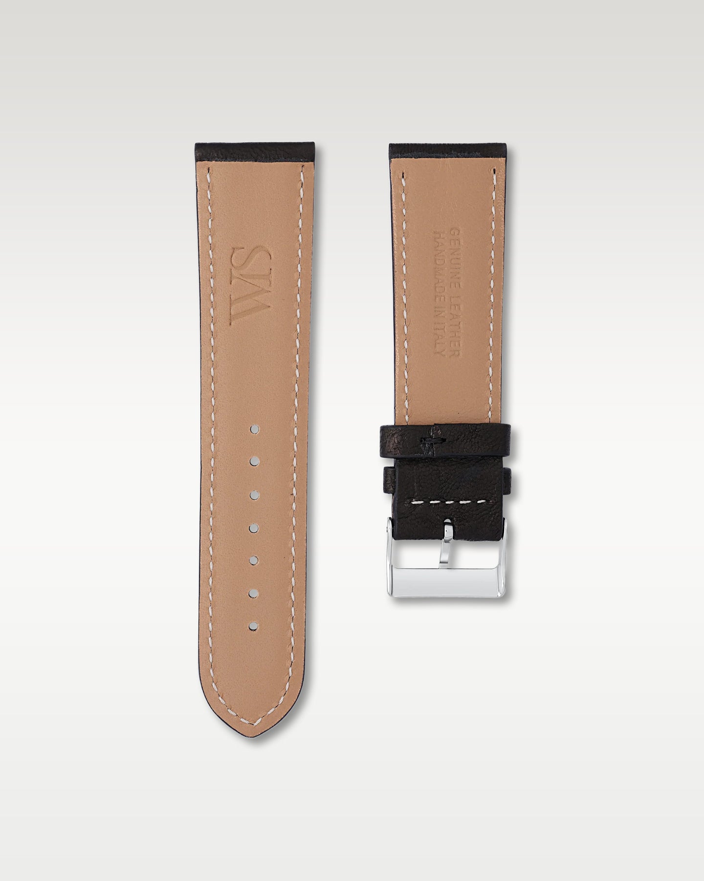 Underside view of the WISSTRAPS 24mm Tuxedo Black Italian calf leather strap showing the stamped WS logo and soft tan lining