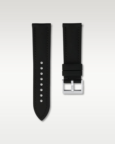 Front layout view of a 24mm pitch black sailcloth watch band detailing its textured cross-hatch fabric finish and brushed steel pin buckle
